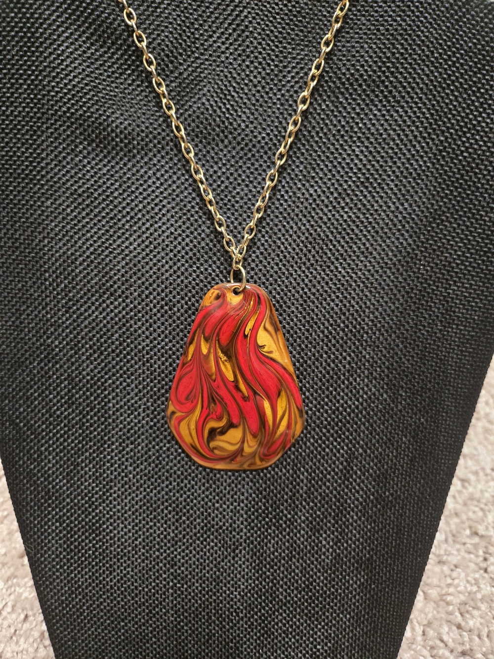 Gold Chain Necklace with Red and Yellow Swirl Pendant